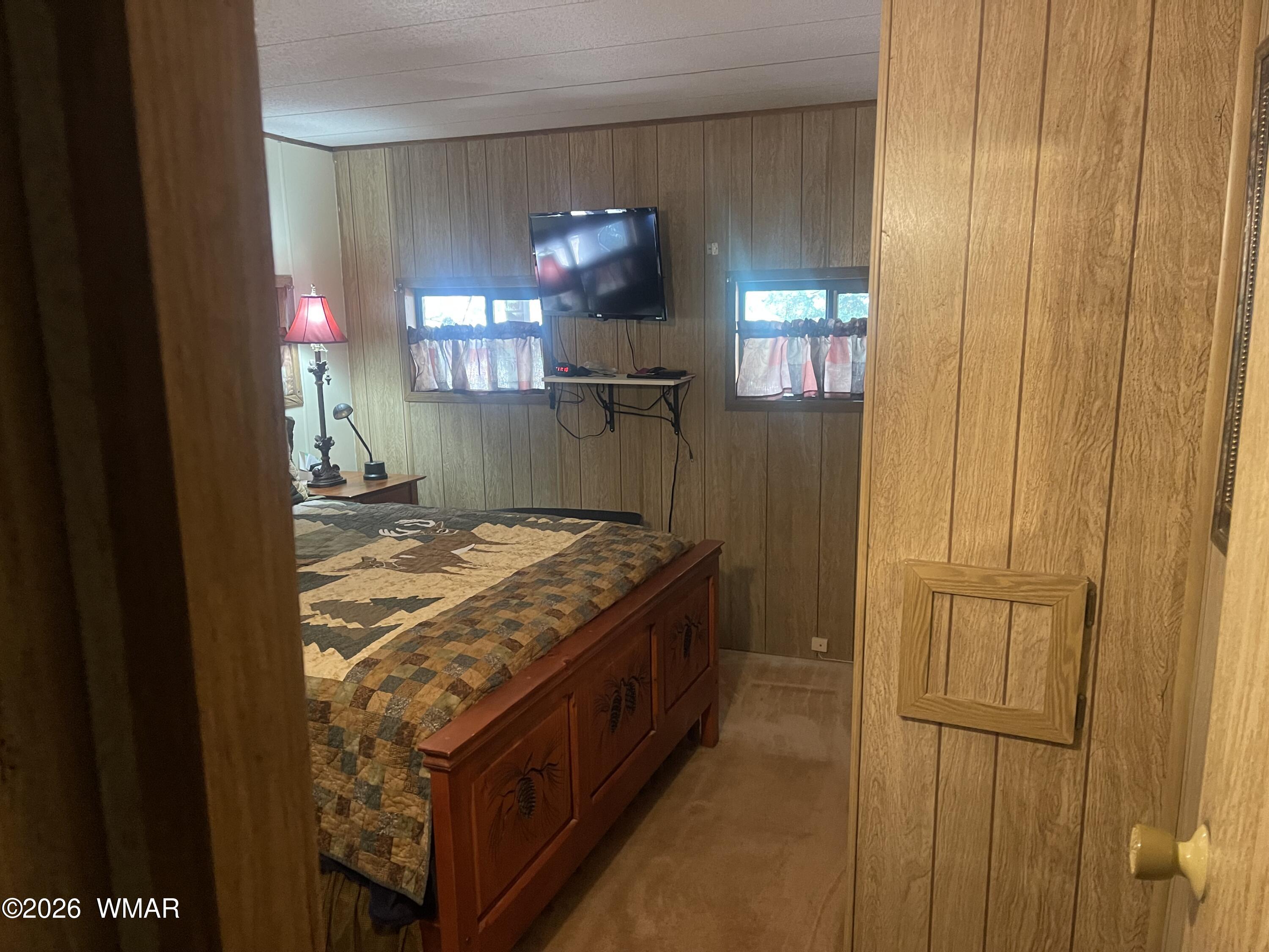 2871 Moose Trail Overgaard, AZ 85933 - Photo 11 of 25 a kitchen with stainless steel appliances granite countertop a refrigerator and a sink