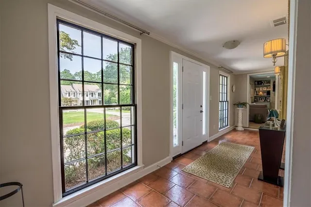 a view of entryway with livingroom