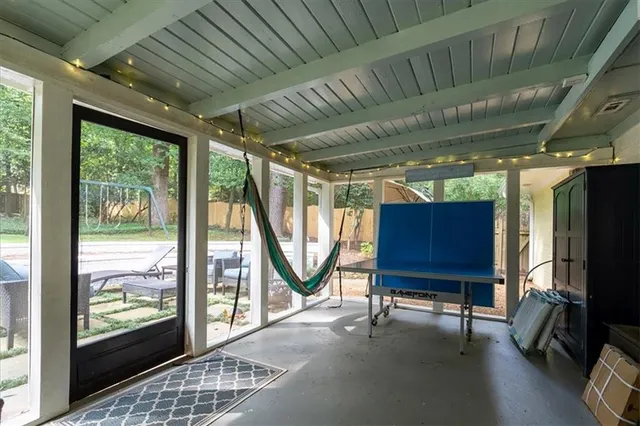 a view of a room with furniture wooden floor and a window