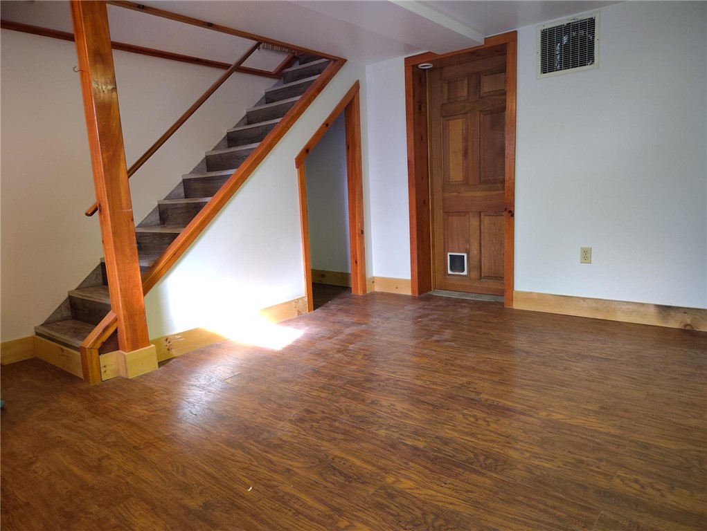 156 River Street Oneonta, NY 13820 - Photo 21 of 31 Finished basement room with under stair storage.