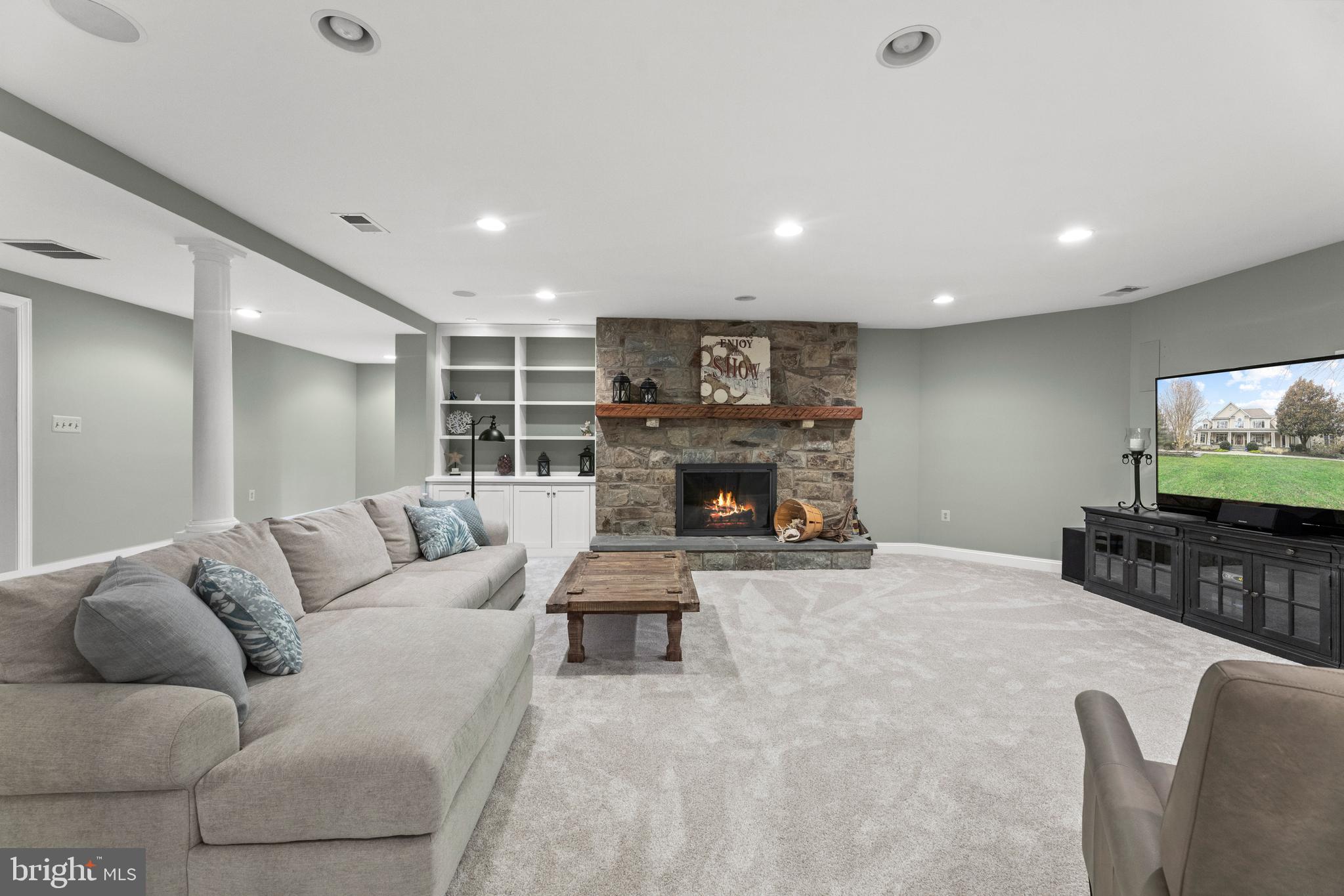 44 Poplar Point Road Edgewater, MD 21037 - Photo 44 of 49 Lower level family room w/ fireplace