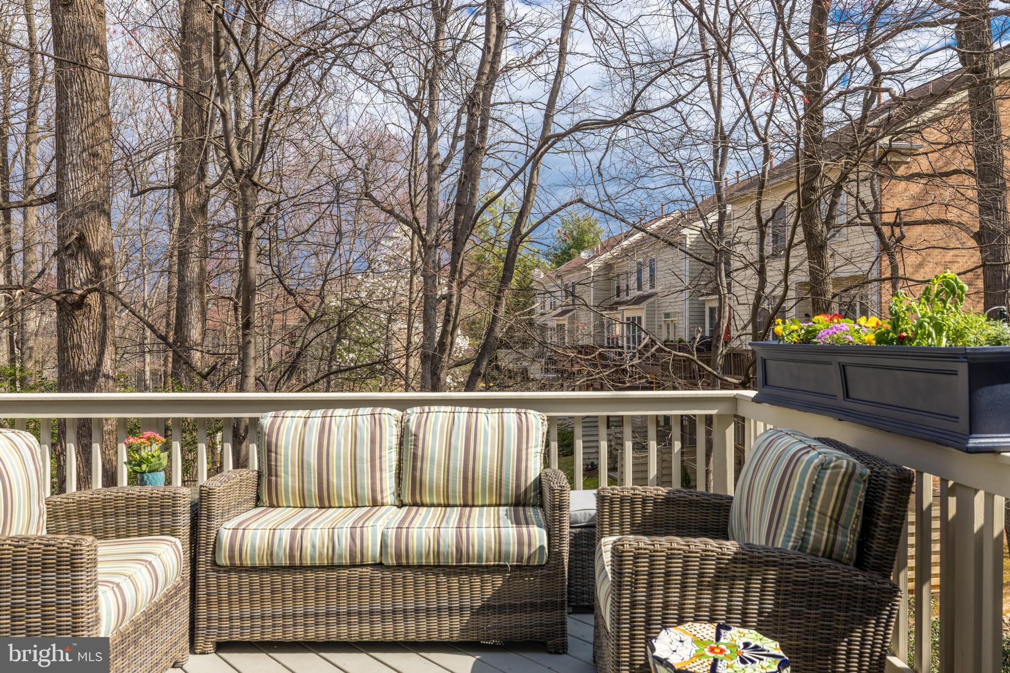 11408 Summer House Court Reston, VA 20194 - Photo 14 of 35 a roof deck with couches and wooden fence