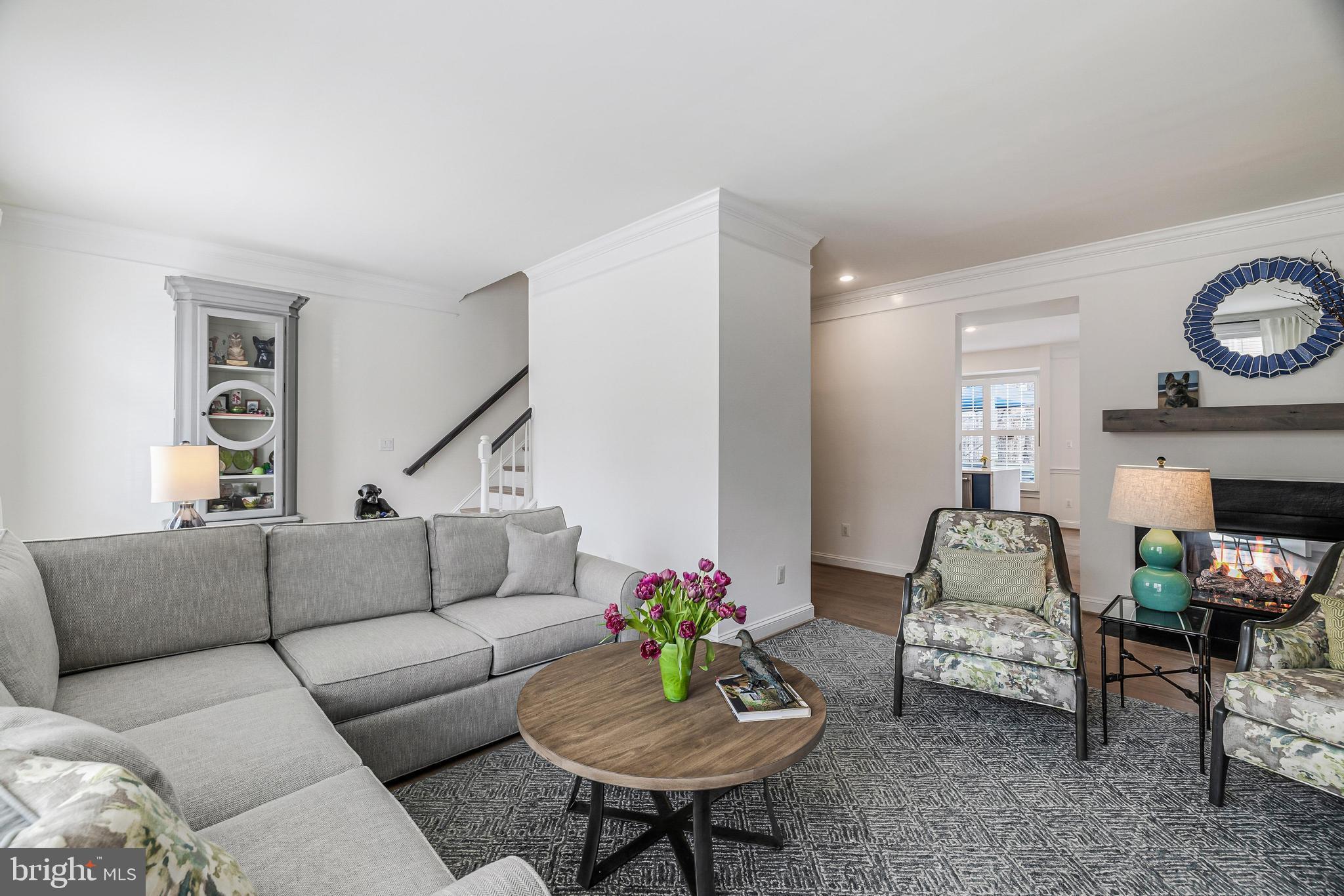 11408 Summer House Court Reston, VA 20194 - Photo 17 of 35 a living room with furniture and a fireplace