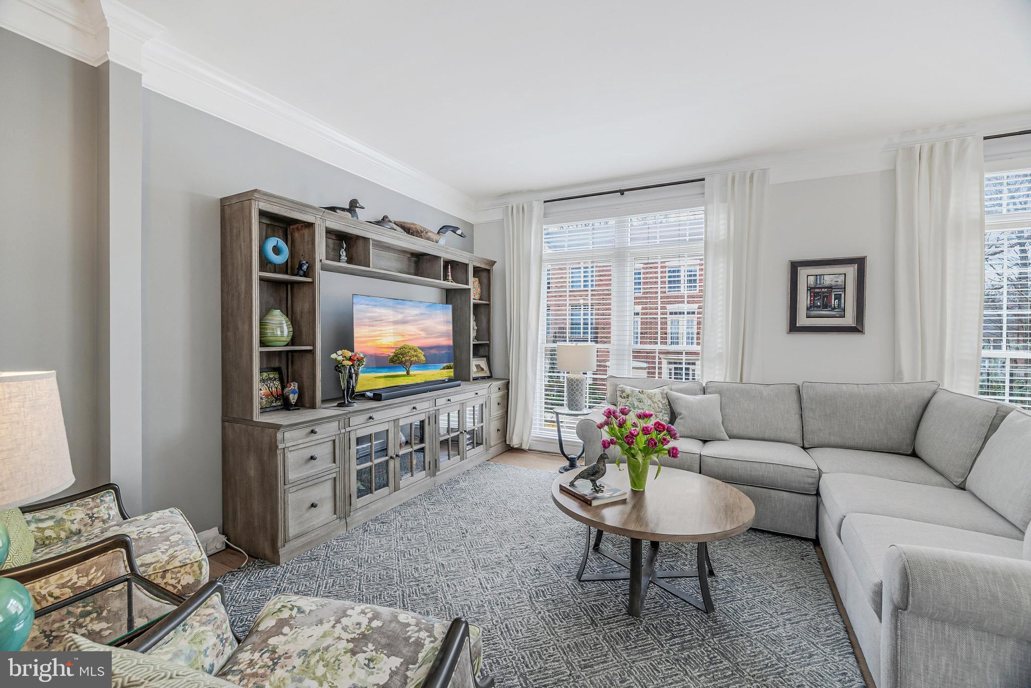 11408 Summer House Court Reston, VA 20194 - Photo 18 of 35 a living room with furniture and a flat screen tv