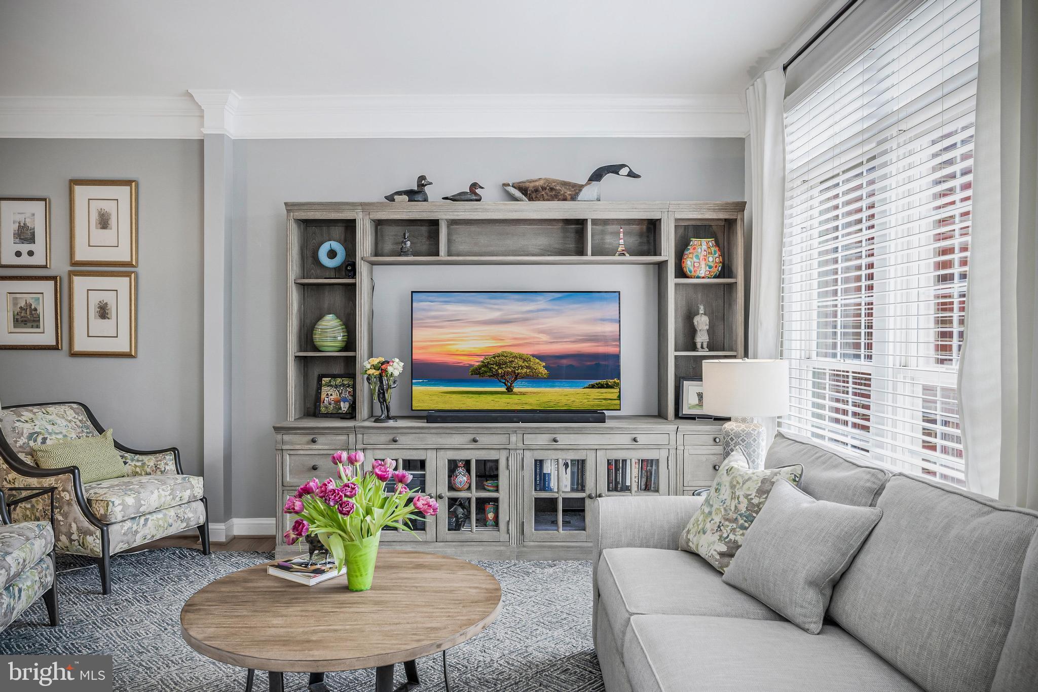 11408 Summer House Court Reston, VA 20194 - Photo 19 of 35 a living room with furniture and a flat screen tv