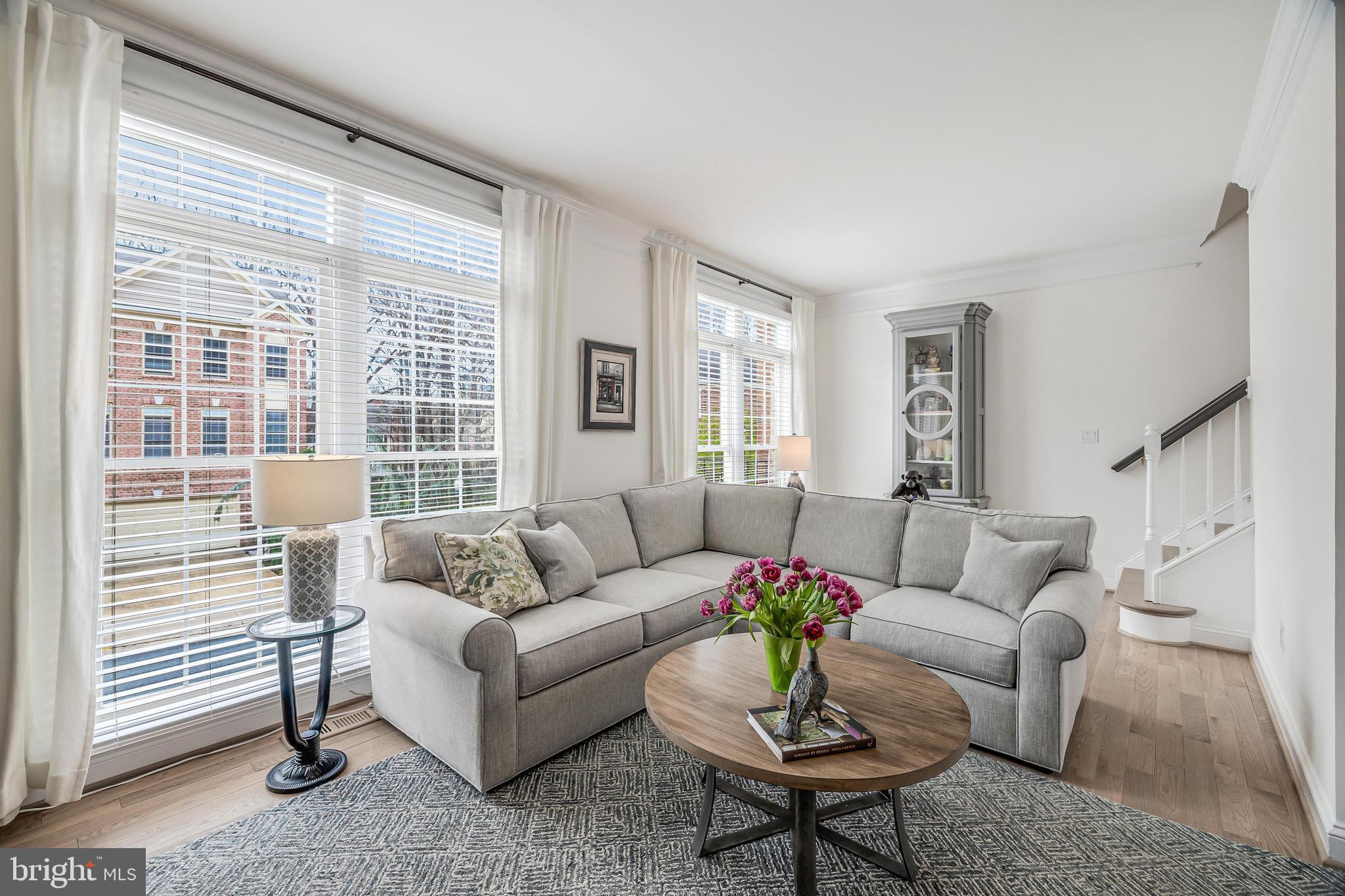 11408 Summer House Court Reston, VA 20194 - Photo 20 of 35 a living room with furniture and a large window