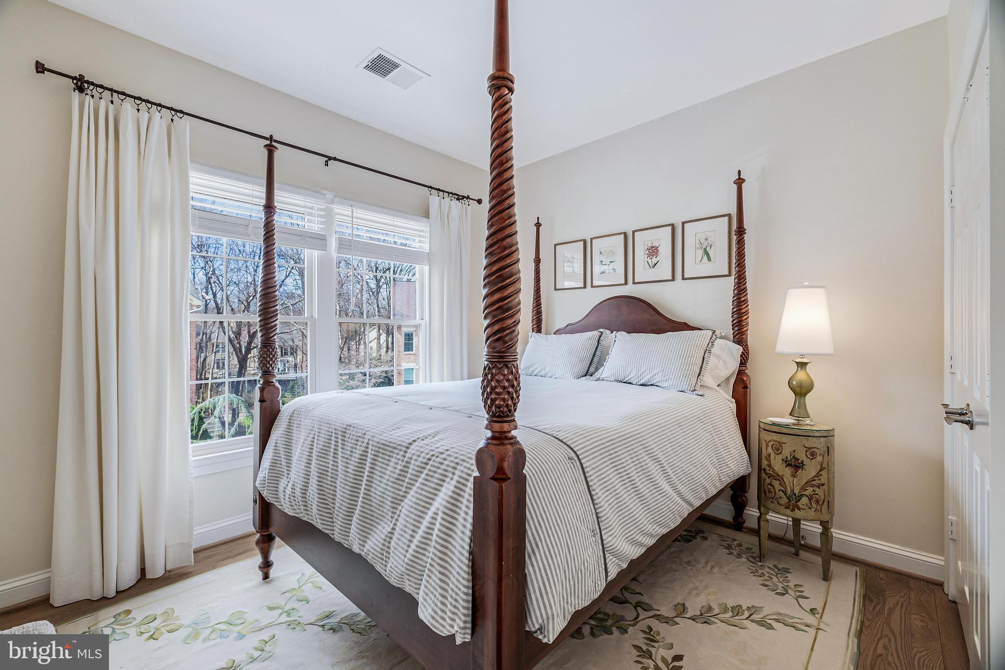 11408 Summer House Court Reston, VA 20194 - Photo 25 of 35 a bedroom with a large bed and a window