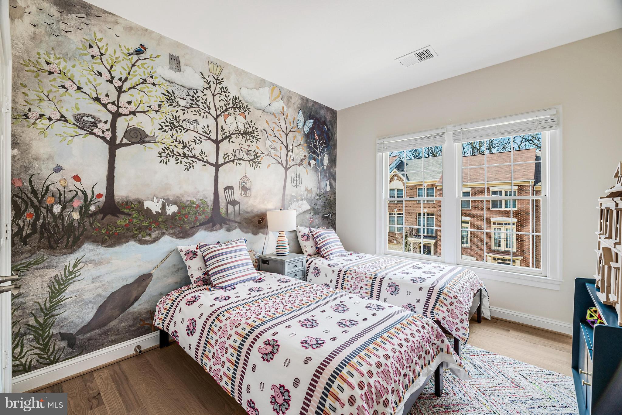 11408 Summer House Court Reston, VA 20194 - Photo 27 of 35 a bedroom with bed and wooden floor