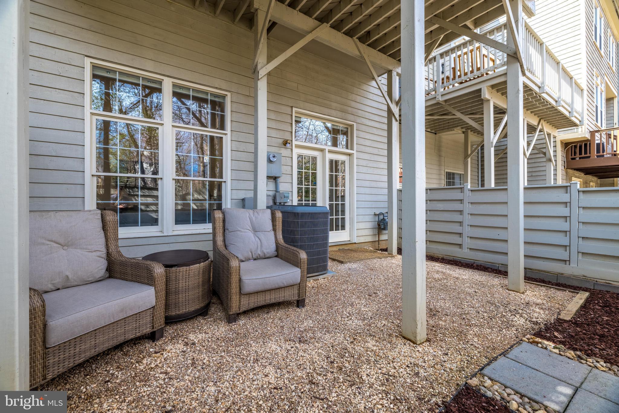 11408 Summer House Court Reston, VA 20194 - Photo 33 of 35 a view of a porch with a bench