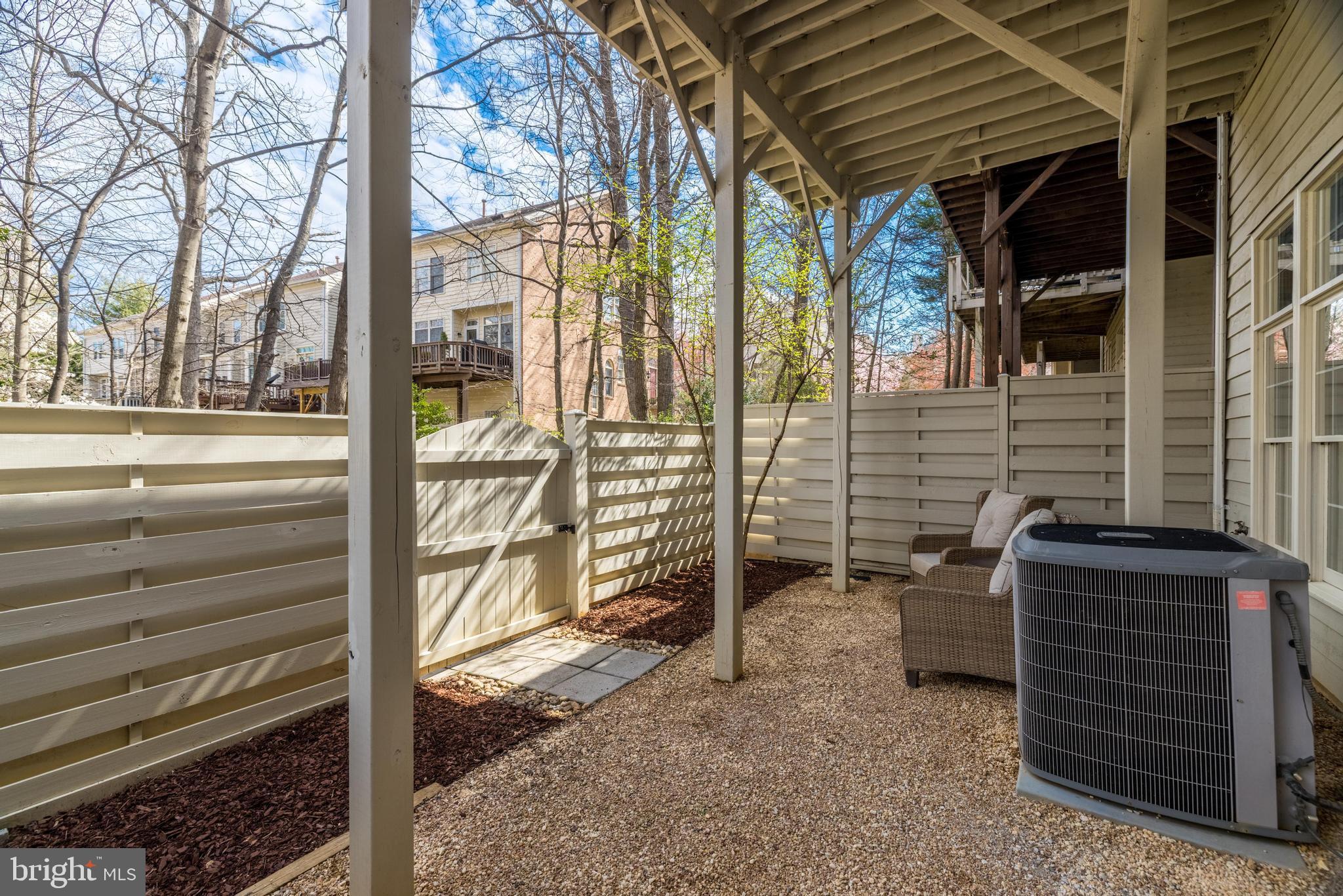 11408 Summer House Court Reston, VA 20194 - Photo 34 of 35 a view of a house with a backyard