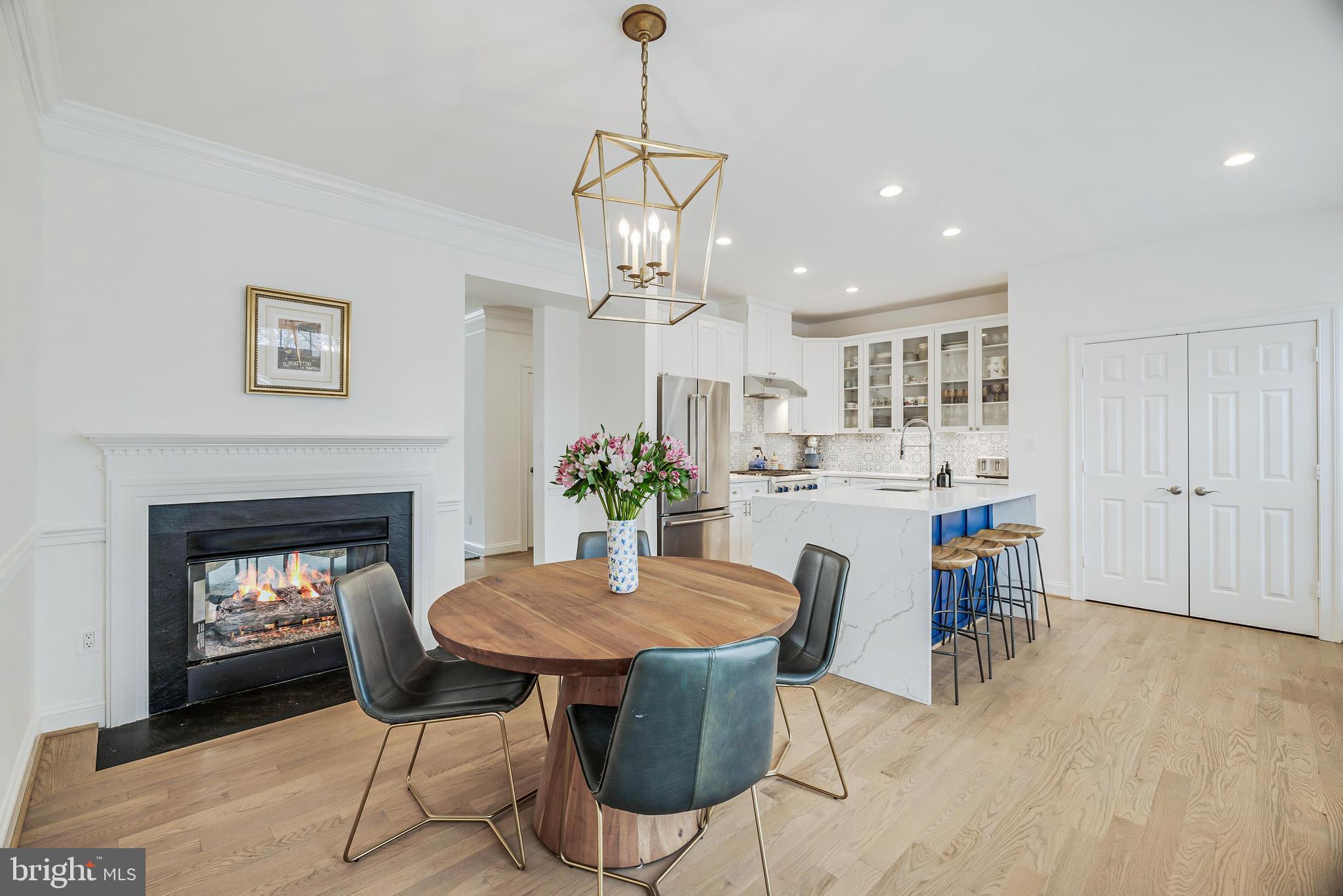 11408 Summer House Court Reston, VA 20194 - Photo 10 of 35 a view of a dining room with furniture and chandelier