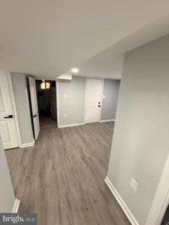 a bathroom with a toilet sink and shower