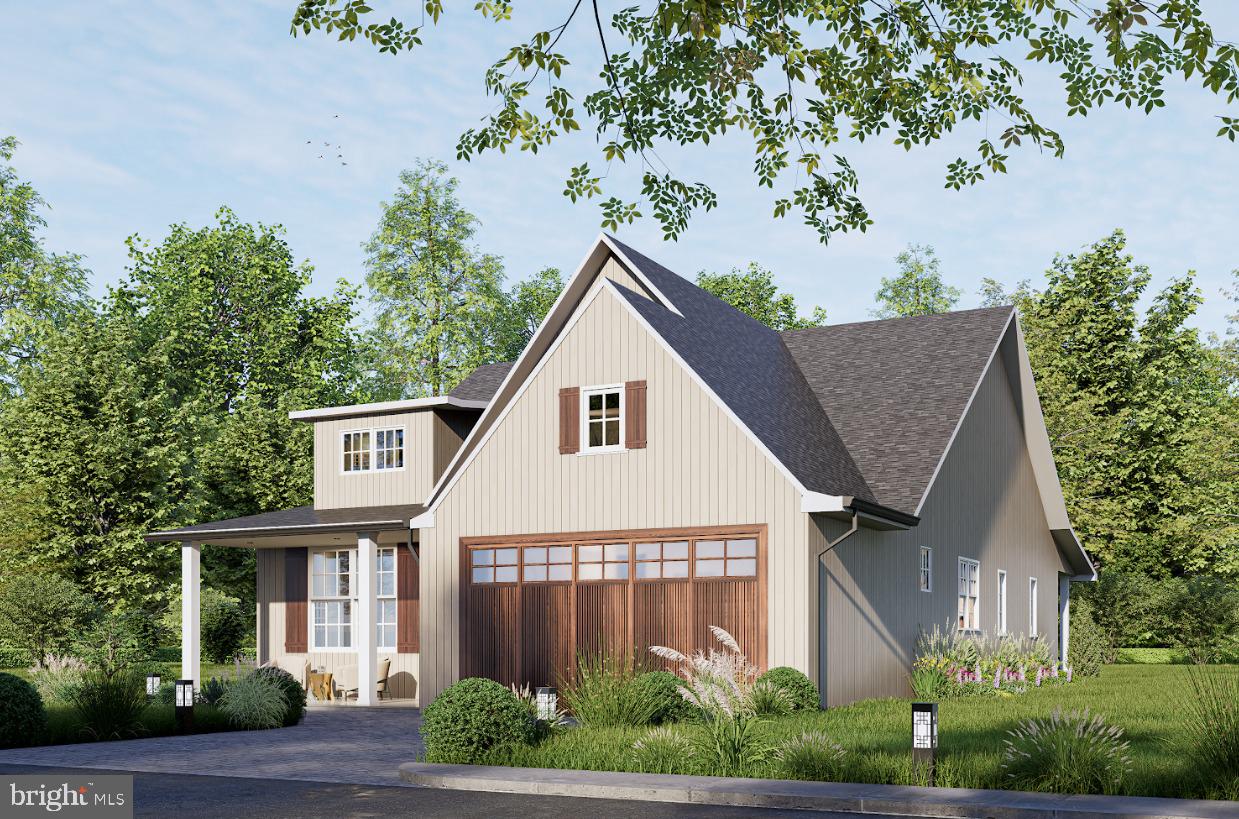 1635 Indiana Avenue Woodbridge, VA 22191 - Photo 2 of 10 a view of a white house next to a yard