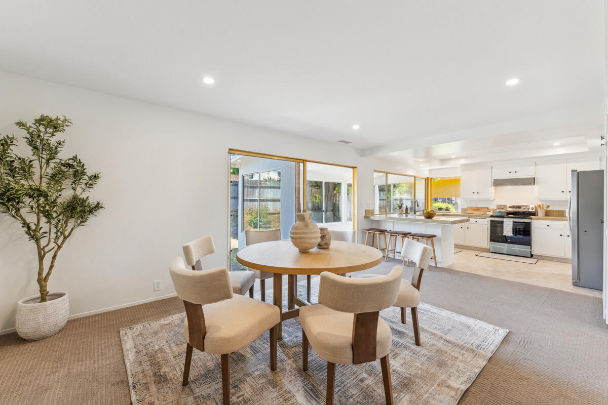 7286 Georgetown Road Goleta, CA 93117 - Photo 14 of 19 a view of a dining room with furniture and wooden floor