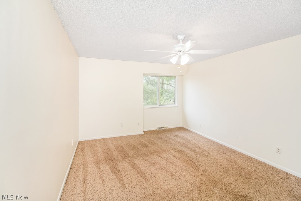 452 Hampton Ridge Drive Akron, OH 44313 - Photo 11 of 25 The large master suite features plenty of space for furniture and has an adorable nook.