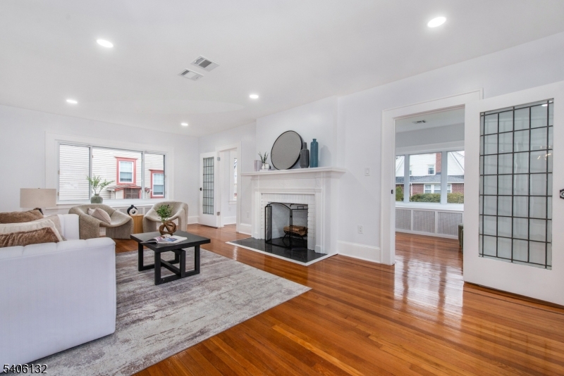 570 Cameron Road South Orange, NJ 07079 - Photo 12 of 34 a living room with furniture and a fireplace