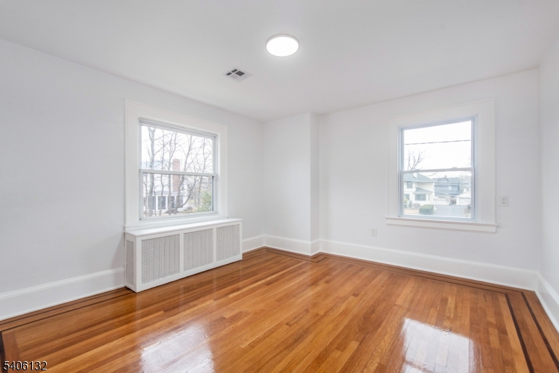 570 Cameron Road South Orange, NJ 07079 - Photo 23 of 34 wooden floor in an empty room with a window