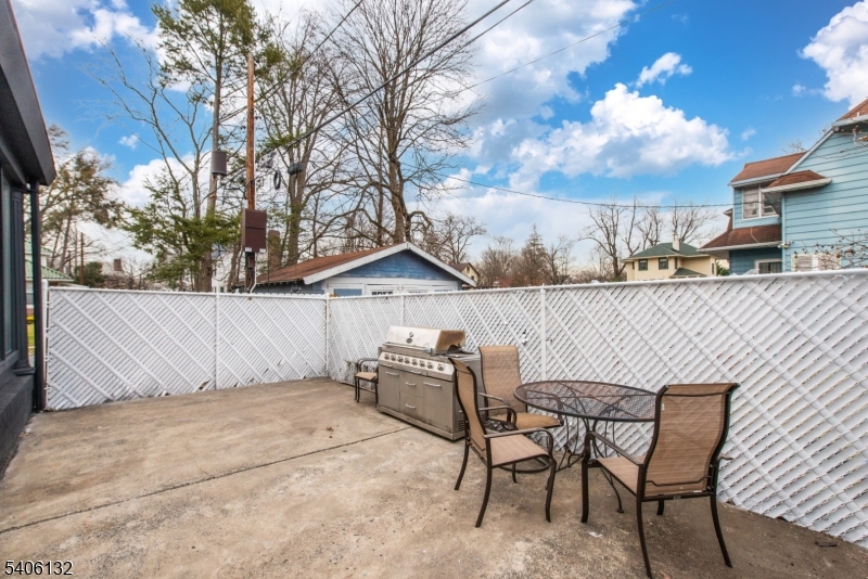 570 Cameron Road South Orange, NJ 07079 - Photo 33 of 34 a view of a chairs and table in backyard