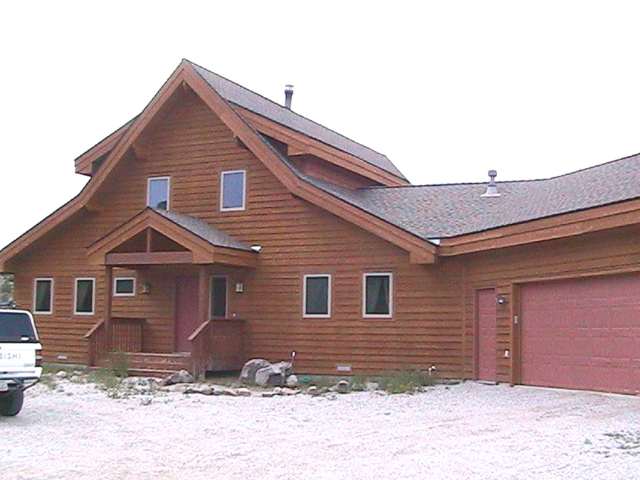 3840 Palisade Road Reno, NV 89521 - Photo 2 of 3 a front view of a house with a yard