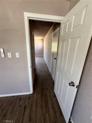 a bathroom with a toilet and a tub