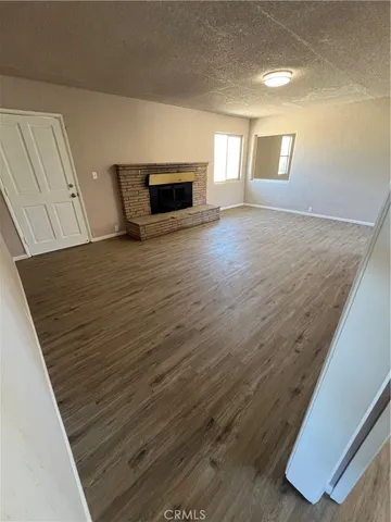 a bathroom with a sink a mirror a bathtub and window