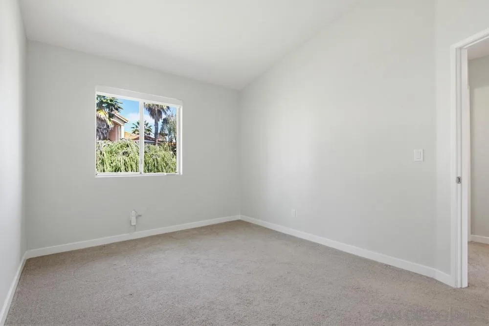 5130 North River Road, Unit B Oceanside, CA 92057 - Photo 36 of 51 an empty room with windows