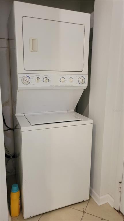 1626 Stickney Point Road, Unit 102 Sarasota, FL 34231 - Photo 21 of 42 a close up view of washer and dryer