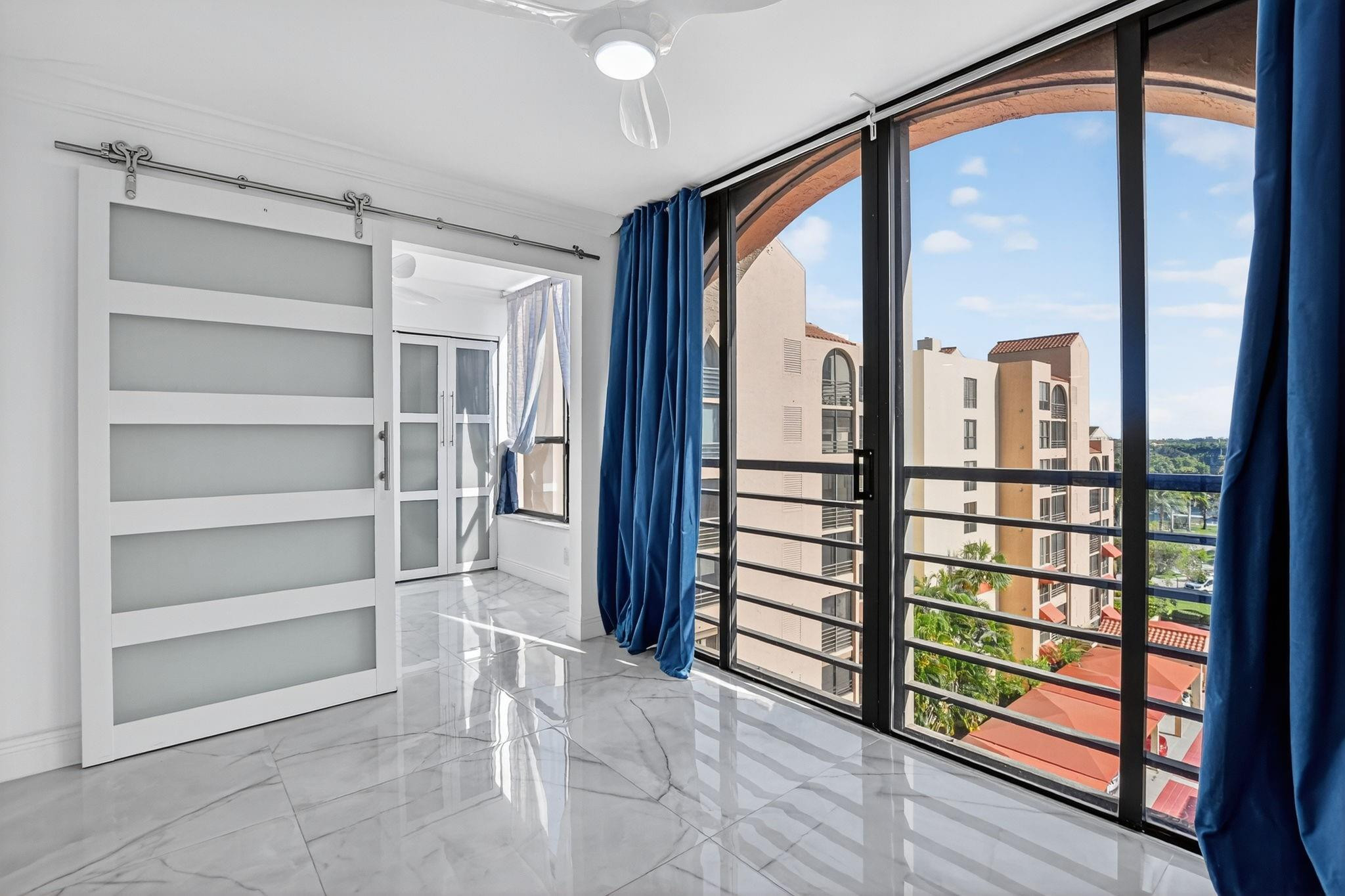 7145 Promenade Drive, Unit C702 Boca Raton, FL 33433 - Photo 35 of 82 a view of a large window with an outdoor space