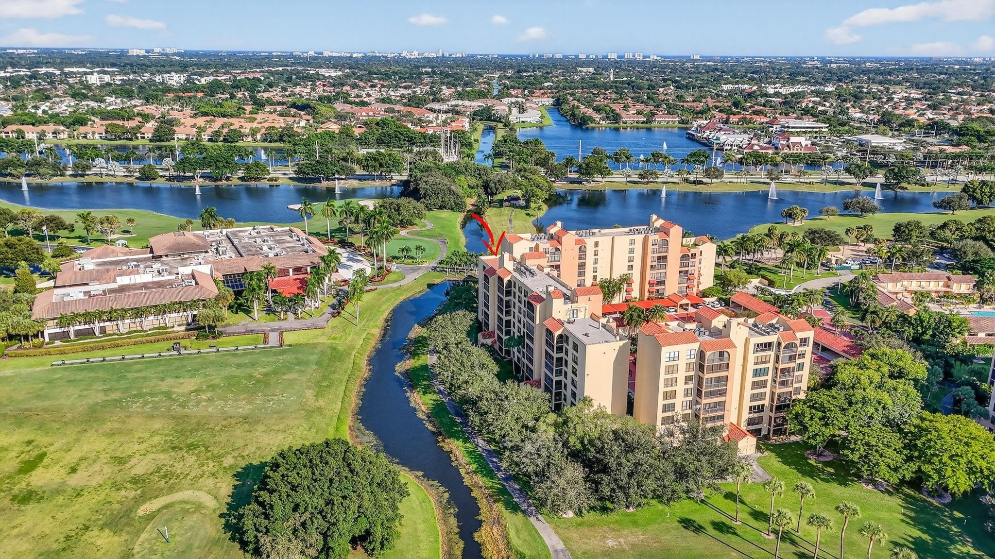 7145 Promenade Drive, Unit C702 Boca Raton, FL 33433 - Photo 62 of 82 an aerial view of residential houses with outdoor space and river