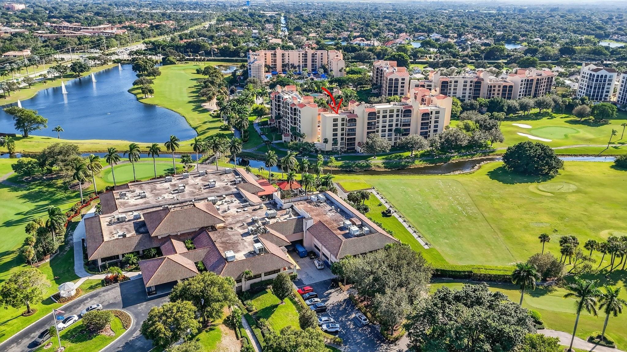 7145 Promenade Drive, Unit C702 Boca Raton, FL 33433 - Photo 66 of 82 an aerial view of residential houses with outdoor space