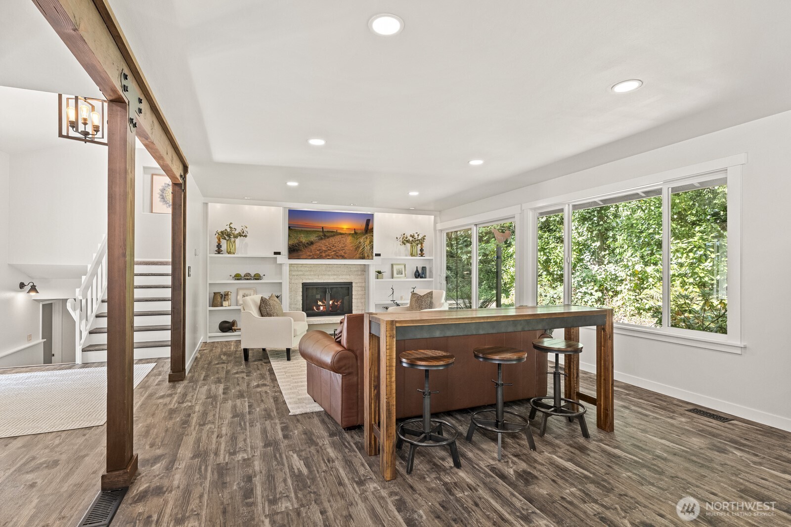 27605 Southeast Issaquah-Fall City Road Fall City, WA 98024 - Photo 12 of 39 a view of a dining room with furniture window and wooden floor