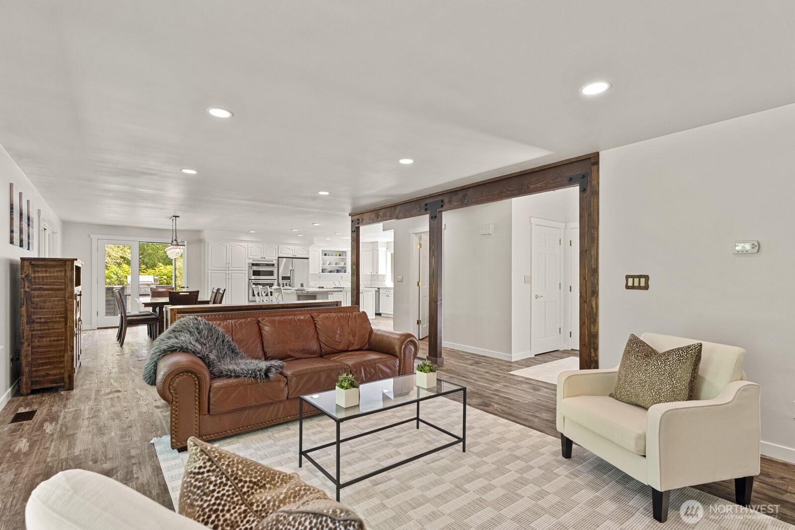 27605 Southeast Issaquah-Fall City Road Fall City, WA 98024 - Photo 14 of 39 a living room with furniture and a large window