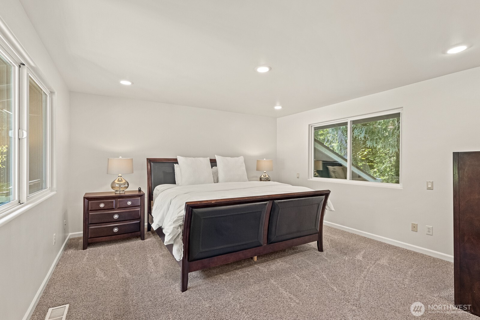 27605 Southeast Issaquah-Fall City Road Fall City, WA 98024 - Photo 16 of 39 a spacious bedroom with a bed and a window