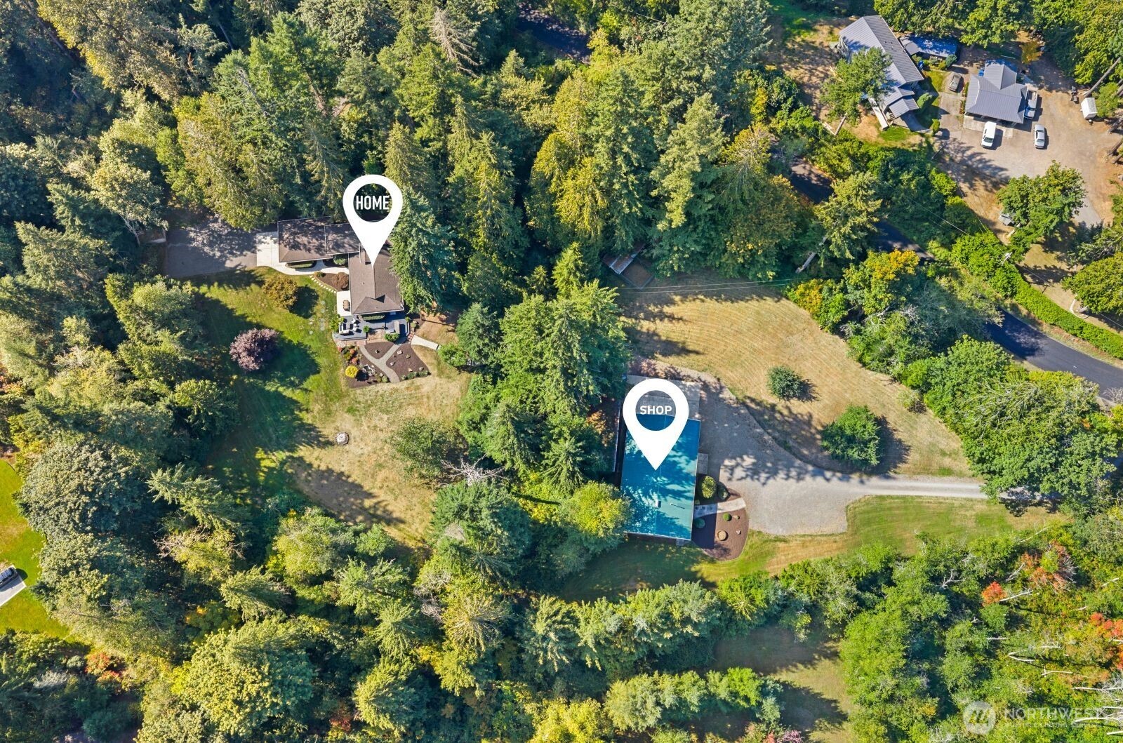 27605 Southeast Issaquah-Fall City Road Fall City, WA 98024 - Photo 3 of 39 a view of a lake with a tree