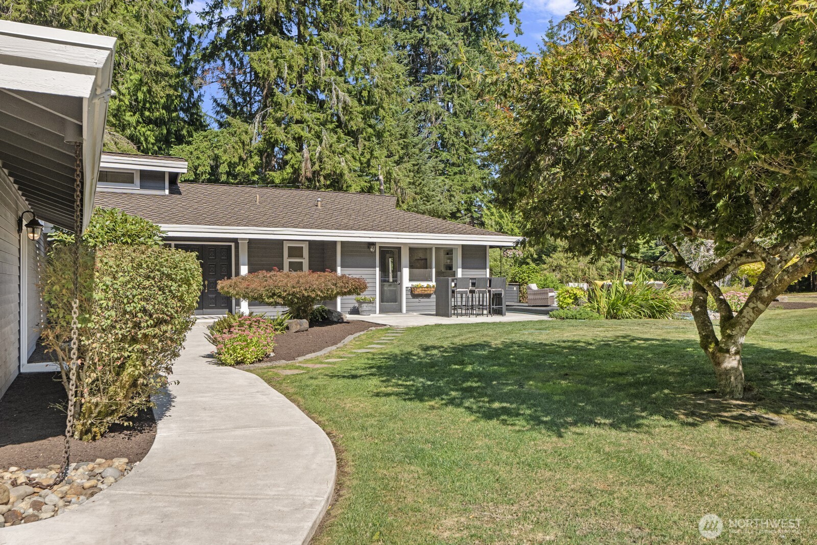 27605 Southeast Issaquah-Fall City Road Fall City, WA 98024 - Photo 4 of 39 a front view of a house with garden