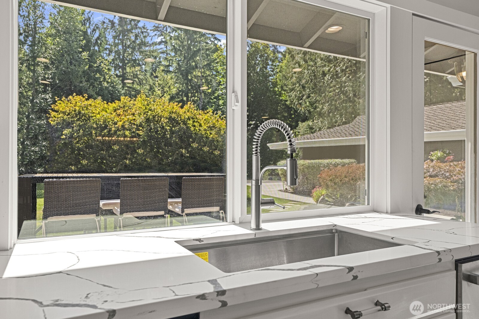 27605 Southeast Issaquah-Fall City Road Fall City, WA 98024 - Photo 9 of 39 a view of a sink and tub with a large window