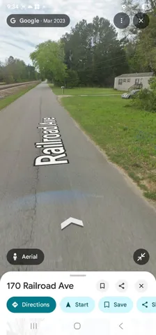 a view of a lake with a big yard