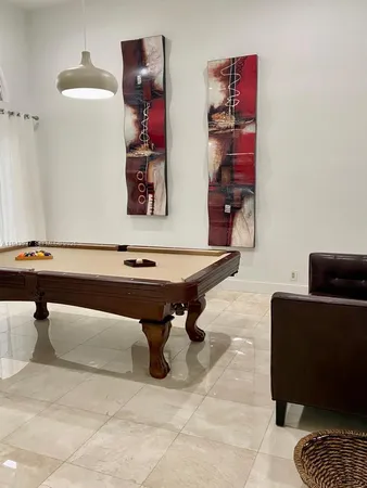 a living room with couch and furniture