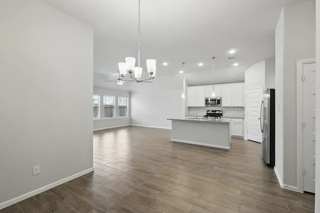 a view of a backyard with a garden