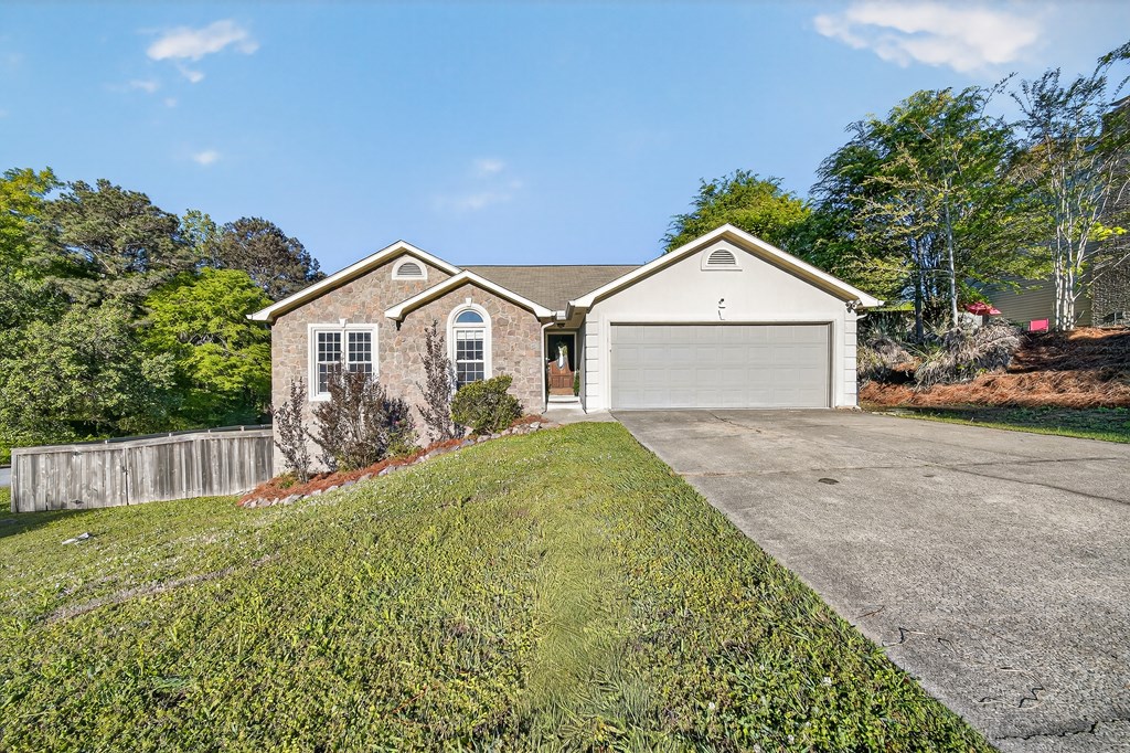 7333 Cedar Creek Loop Columbus, GA 31904 - Photo 2 of 37 a view of a house with a yard and large tree