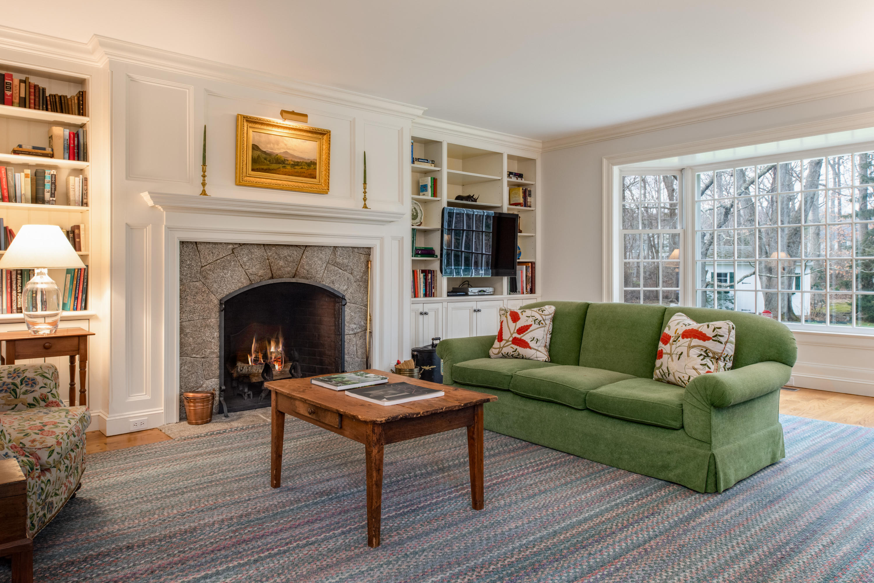 41 St Nicholas Road Darien, CT 06820 - Photo 18 of 39 a living room with furniture and a fireplace