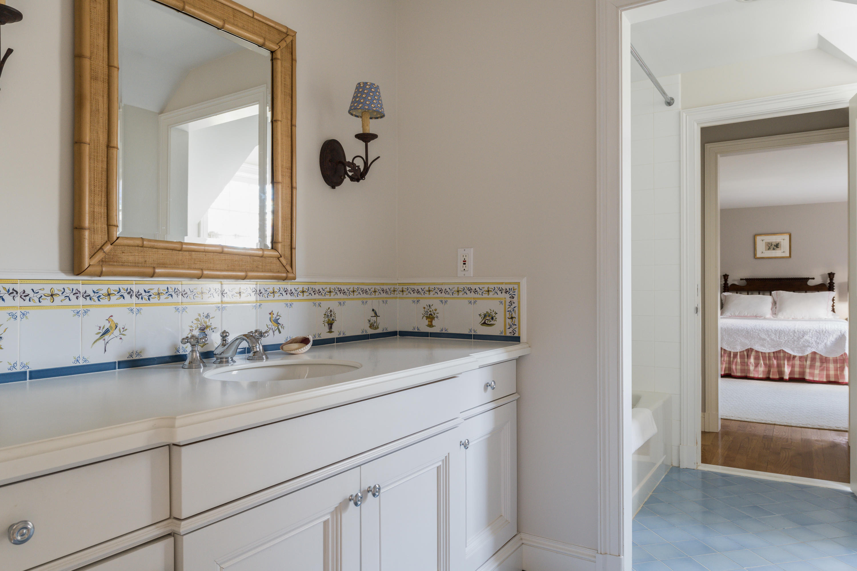 41 St Nicholas Road Darien, CT 06820 - Photo 25 of 39 a bathroom with a sink and a mirror