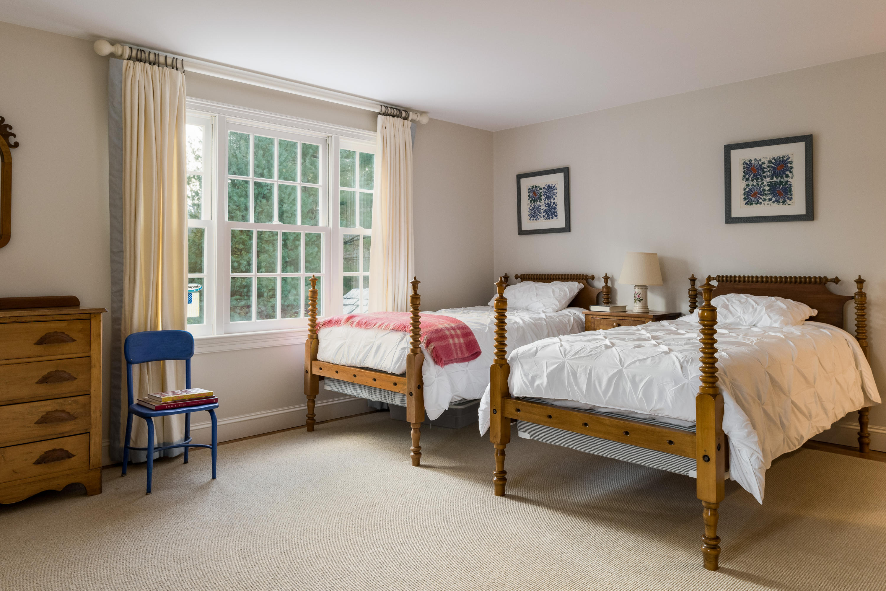 41 St Nicholas Road Darien, CT 06820 - Photo 28 of 39 a spacious bedroom with a bed and a couch