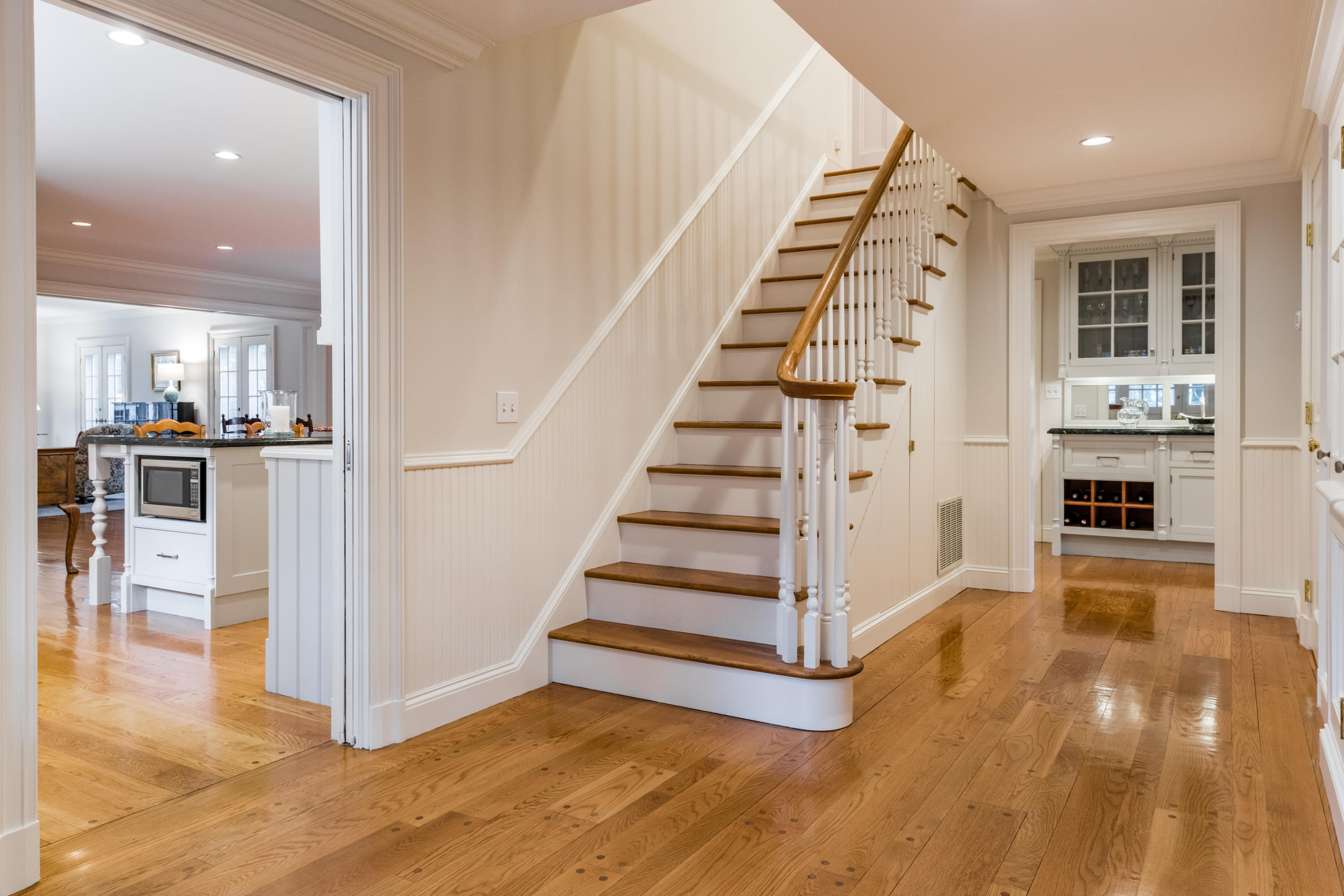 41 St Nicholas Road Darien, CT 06820 - Photo 3 of 39 a view of a kitchen with wooden floor and electronic appliances