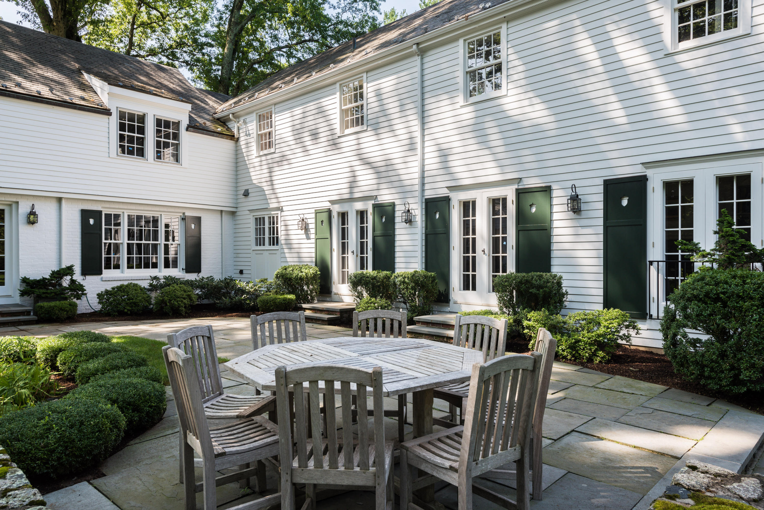 41 St Nicholas Road Darien, CT 06820 - Photo 34 of 39 a view of a house with backyard and sitting area