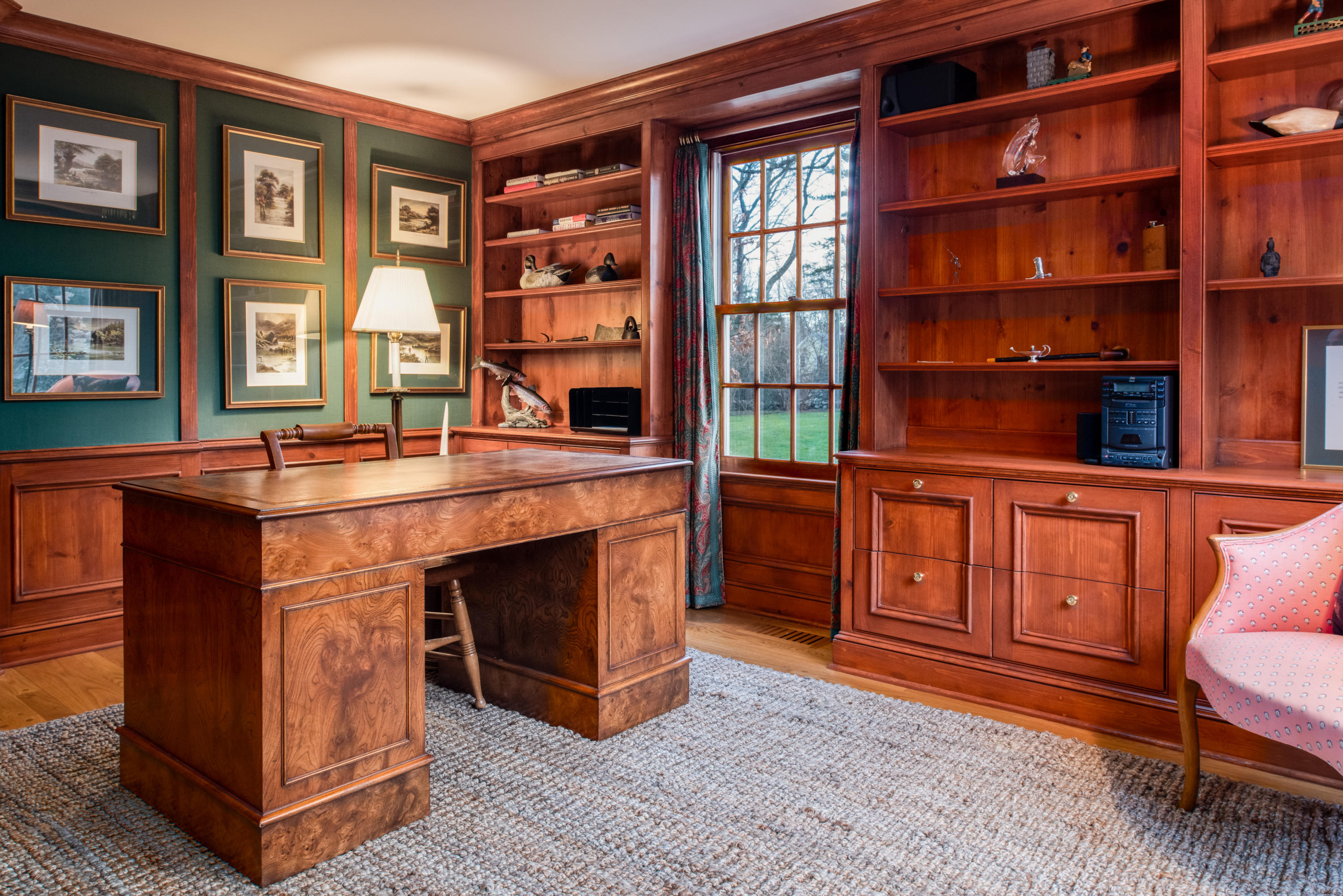 41 St Nicholas Road Darien, CT 06820 - Photo 9 of 39 a room with bookshelf and a fireplace