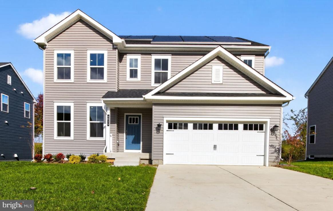 4014 Millner Road Nottingham, MD 21236 - Photo 1 of 15 a view of white house with a yard and plants