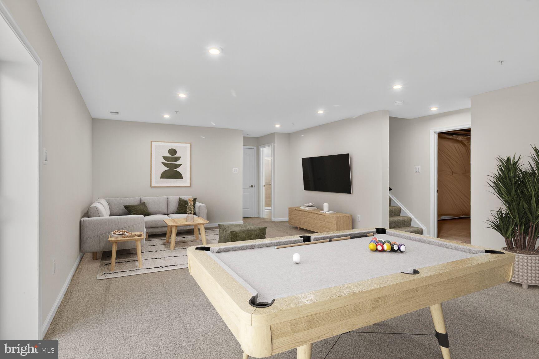 4014 Millner Road Nottingham, MD 21236 - Photo 14 of 15 a living room with furniture and a flat screen tv