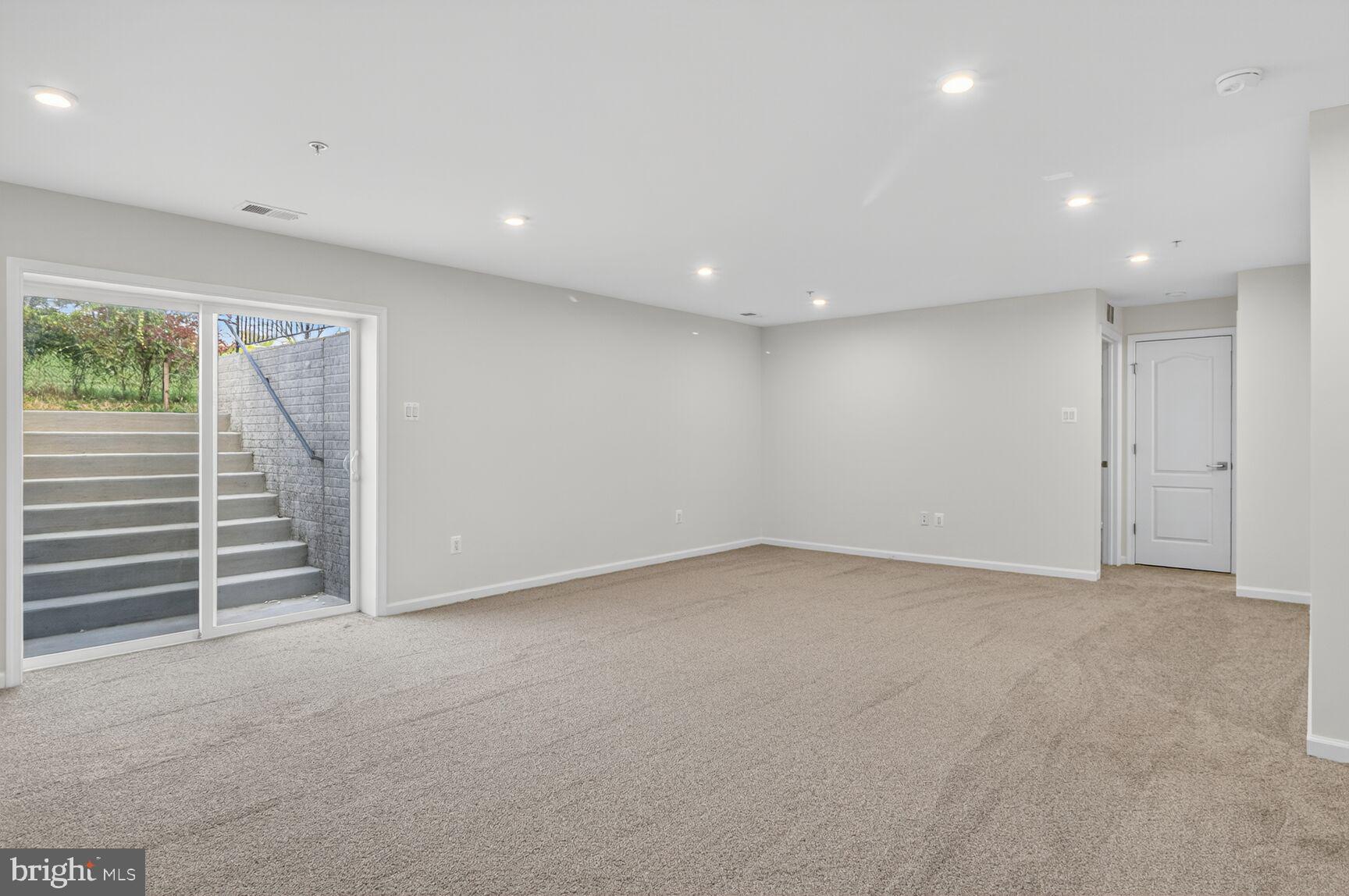 4014 Millner Road Nottingham, MD 21236 - Photo 15 of 15 a view of an empty room with stairs