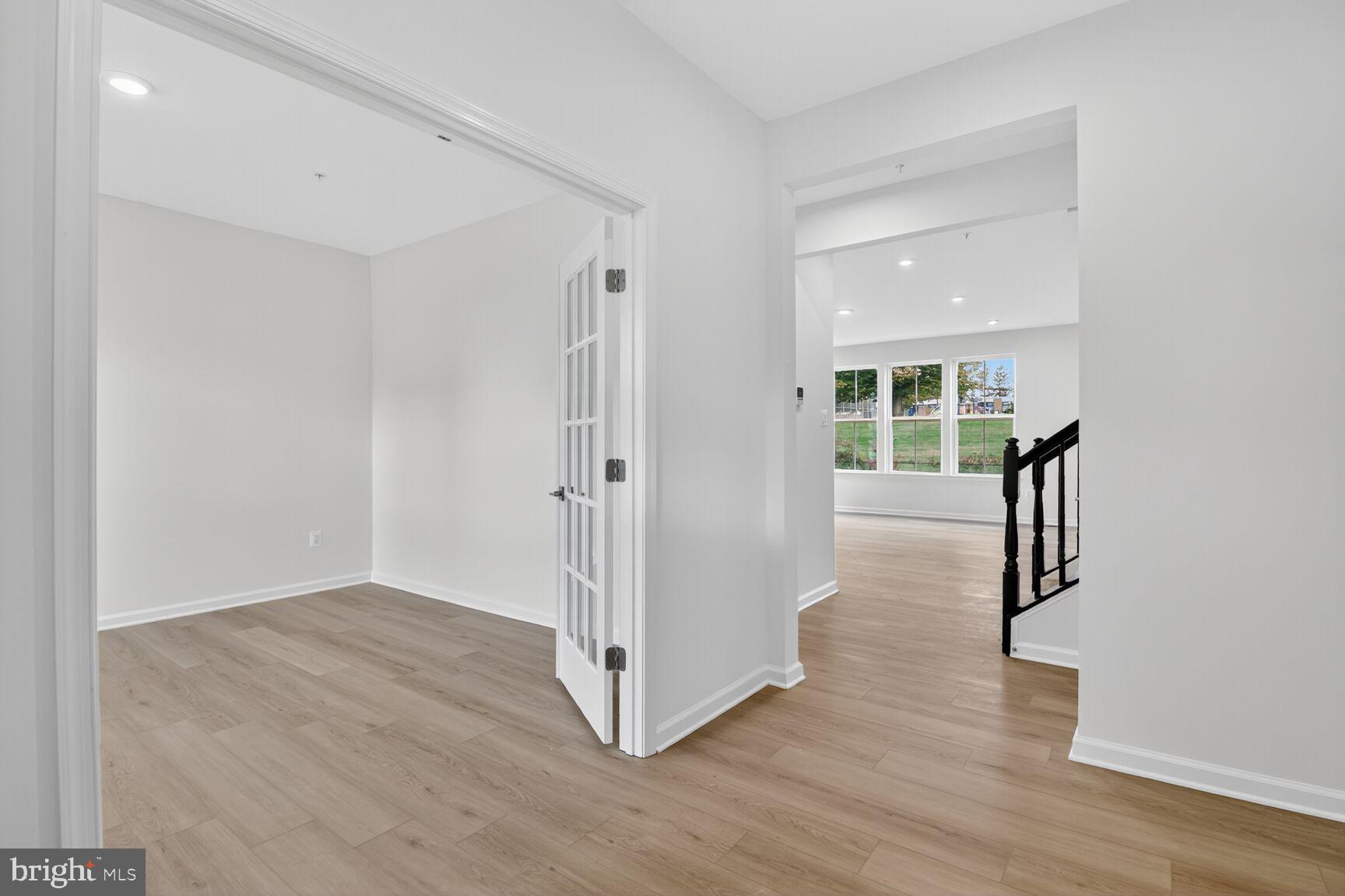 4014 Millner Road Nottingham, MD 21236 - Photo 6 of 15 a view of a hallway with wooden floor and entryway